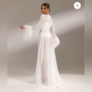 An elegant bathrobe with a train and a belt.